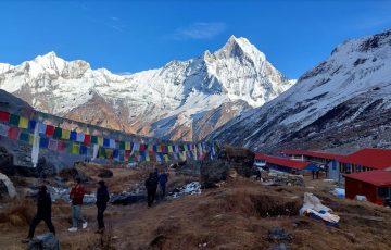 Annapurna Base Camp with Machhapuchhre Fishtail Mountain and prayer flags Annapurna Base Camp with Machhapuchhre Fishtail Mountain and prayer flags