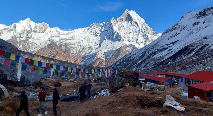 Annapurna Base Camp with Machhapuchhre Fishtail Mountain and prayer flags