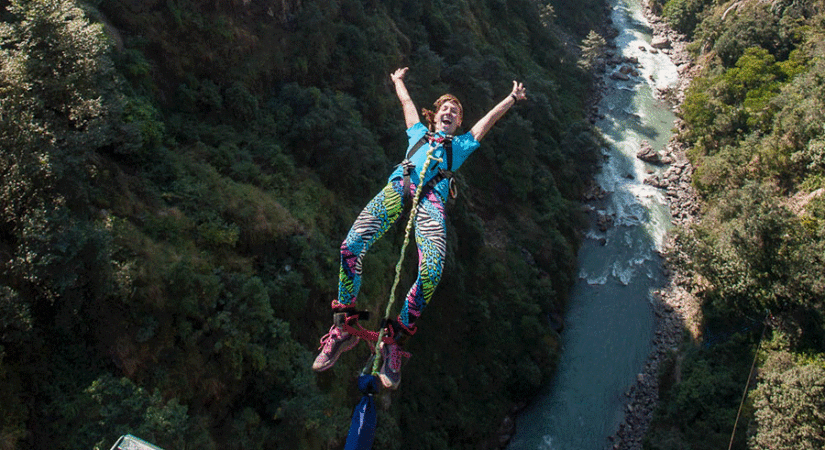  Bungee Jumping at Bhotekoshi River is an experience you won’t soon forget. Located in the eastern part of Nepal, this jump is one of the most popular in the country and provides an incredible adrenaline rush. The jump is operated by an experienced team who provides top-of-the-line safety equipment and experienced instructors. The jump itself takes place from a bridge that is suspended 160 meters above the Bhotekoshi River, making it one of the highest bungee jumps in the world. The experience begins with a scenic drive to the Bhotekoshi River where you’ll get a chance to take in the stunning views of the surrounding landscape. Upon arrival, you’ll be fitted with a full-body harness and given a safety briefing before making the jump. The instructors will talk you through the whole process and will be there to offer support and reassurance throughout. Once you’re ready, you’ll be able to make the jump from the bridge and feel the exhilaration of freefalling through the air. The jump is followed by an unforgettable ride back up the bridge as the bungee cord yanks you back up. The experience lasts for around two minutes and is an amazing way to get your adrenaline pumping. At the end of the jump, you’ll receive a certificate to commemorate your experience and a souvenir t-shirt to take home as a reminder of your amazing adventure. So if you’re looking for an unforgettable experience, Bungee Jumping at Bhotekoshi River is the perfect option! 