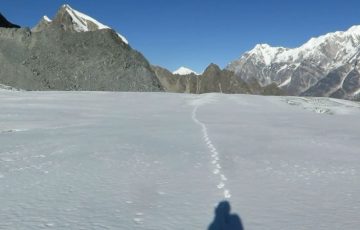 Ganja La Pass summit crossing in Langtang with snowy Himalayan mountains