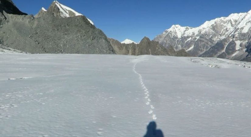 Ganja La Pass summit crossing in Langtang with snowy Himalayan mountains