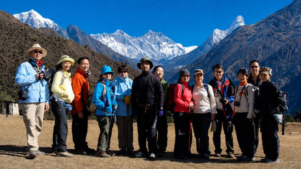 Trekkers enjoying Himalayan views at the Sagarmatha National Park Museum above Namche Bazaar during the Everest Base Camp Trek.