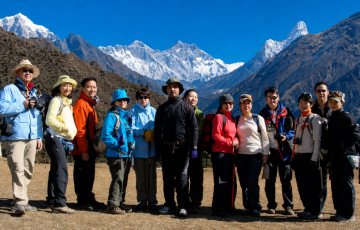 Trekkers enjoying Himalayan views at the Sagarmatha National Park Museum above Namche Bazaar during the Everest Base Camp Trek. Trekkers enjoying Himalayan views at the Sagarmatha National Park Museum above Namche Bazaar during the Everest Base Camp Trek.